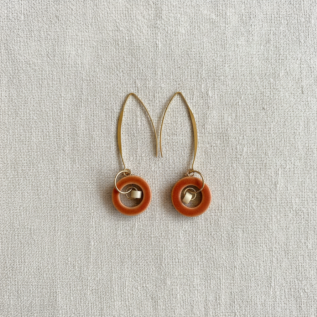 Terracotta Earrings on Linen