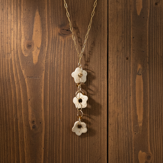 Vertical Flower Necklace on Dark Wood